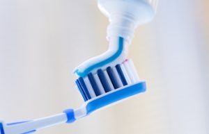 Toothbrush with applied toothpaste