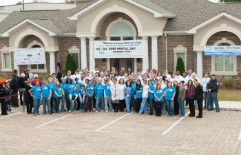 “Free Dental Day” team in front of the clinic building