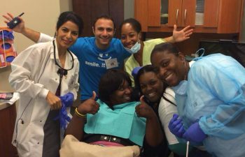 Team “Free Dental Day” and a happy patient