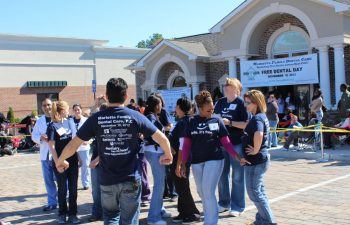 “Free Dental Day” team in front of the clinic building