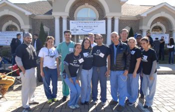 “Free Dental Day” team in front of the clinic building