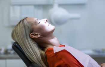 A woman in a dental chair