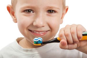 A child brushing teeth