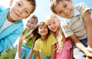 Group of smiling happy children.